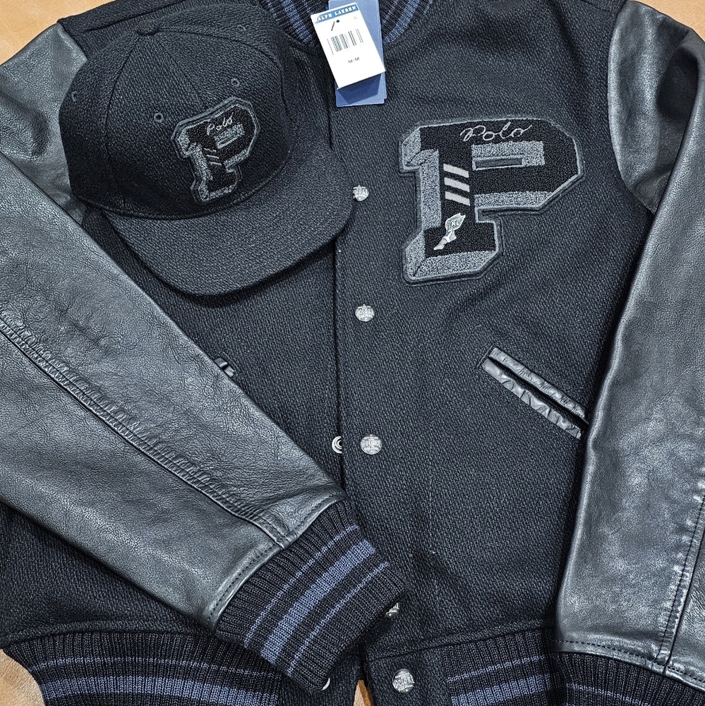 All black Polo Varsity jacket with fitted matching cap.